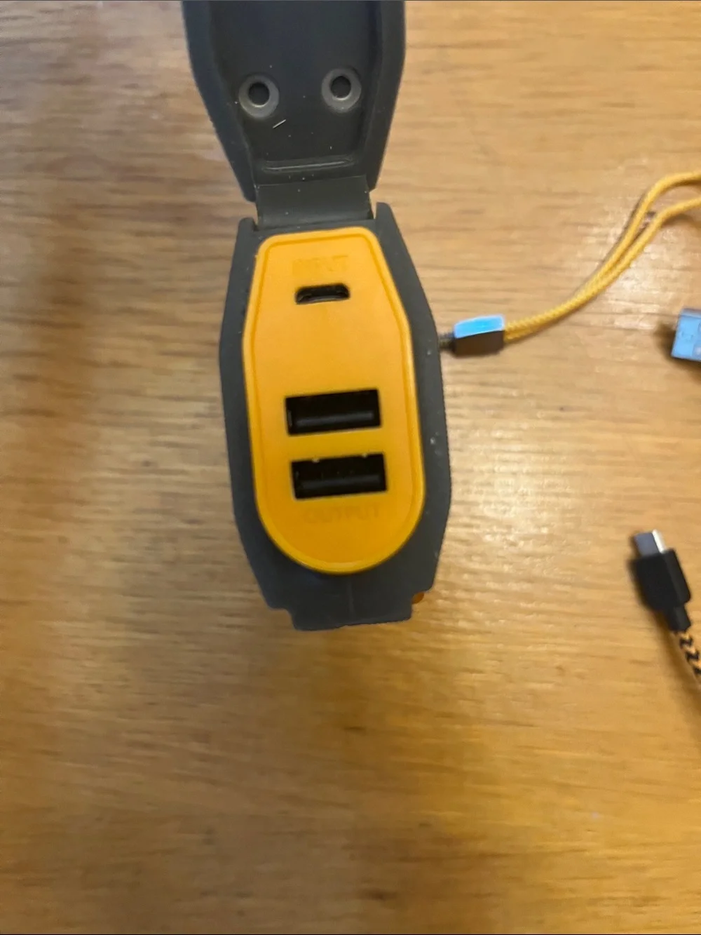 Unbranded Gray Power Bank with Yellow Accents and Braided USB Cable